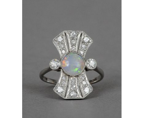 An Art Deco opal and diamond set 18 ct white gold and platinum ring, stamped 18 & PT
 CONDITION REPORTS: Generally in good co