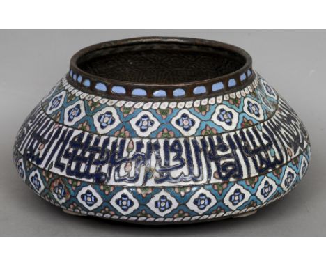 An 18th/19th century Persian copper jardiniere
Of squat baluster form, the exterior with enamel decoration.  44 cms diameter.