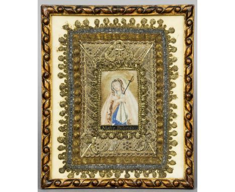 An 18th century reliquary panel
Centred with a portrait of the Virgin Mary, inscribed Mater Dolorosa, framed and glazed.  22 
