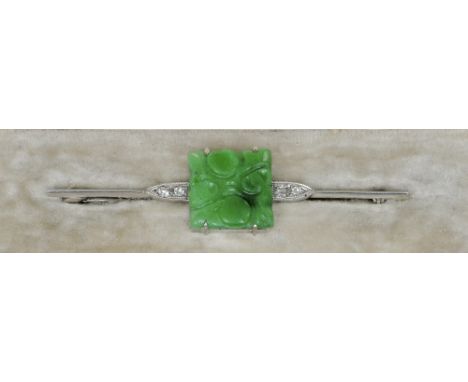 An Art Deco jade and diamond set 18 ct white gold brooch, marked 18ct
In Goldsmiths & Silversmith Co. Ltd fitted box.  6 cm w