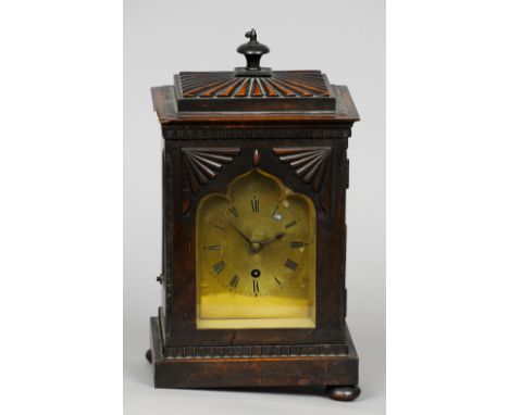 A 19th century mahogany bracket clock
The brass dial with Roman numerals and single winding aperture.  31 cm high. CONDITION 