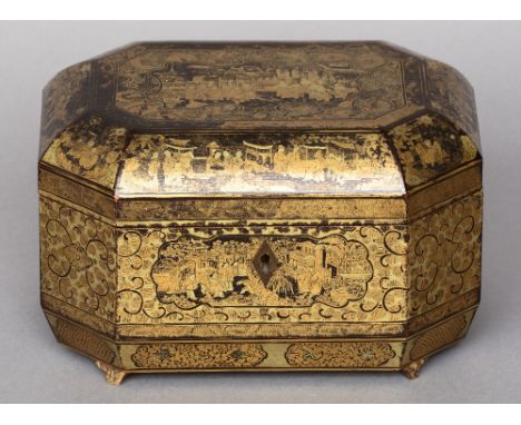 A late 19th century chinoiserie decorated tea caddy
Of canted rectangular form, the domed hinged lid enclosing twin pewter li