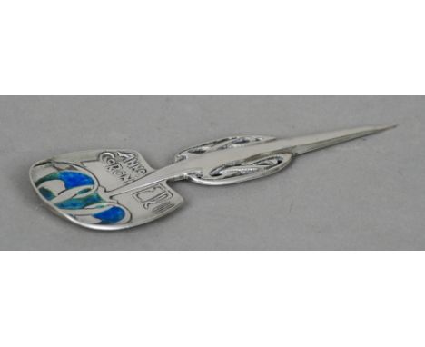 A Liberty &amp; Co. Cymric silver and enamel coronation spoon designed by Archibald Knox, hallmarked Birmingham 1901, maker's