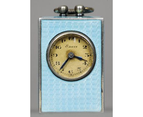 A light blue enamel decorated silver miniature carriage clock 5.25 cm high. CONDITION REPORTS: Chip to enamel to one side, so