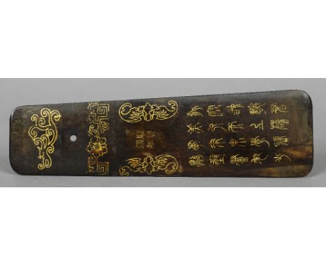 A Chinese bronzed metal spatula
Gilt decorated with figures, bats and archaic calligraphic script and four character Kangxi m