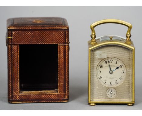 A small late 19th century cased repeating carriage clock
The silvered dial with Arabic numerals inscribed L. Leroy & Cie.  11