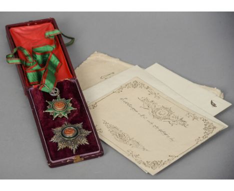 A 19th century Second Class Order of Omanieh
Typically worked in green and red enamels; together with a Star of the Order, si