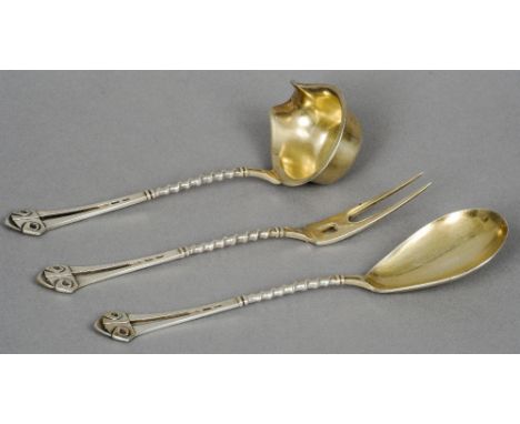 Three pieces of Arts & Crafts 800 silver flatware
Including a twin tined fork, a spoon and a ladle.   The spoon 19 cm high.  