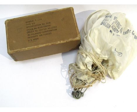 A WWII 1943 dated Irving Air Chute Co pilot parachute together with a US Army B8 goggle box (2)