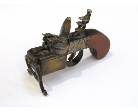 A flintlock pistol form table lighter     ANTIQUE FIREARM: No license required