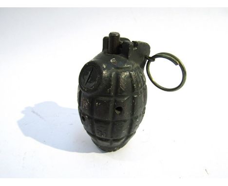 A WWII British Army No. 36 Mills grenade, painted in green, deactivated