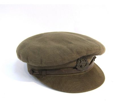 A British Army Officers peaked cap with East Lancashire Egypt Regiment badge 