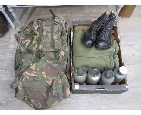 Three British Army jackets including camo, a camouflage backpack and a pair of military grade black leather boots etc. 