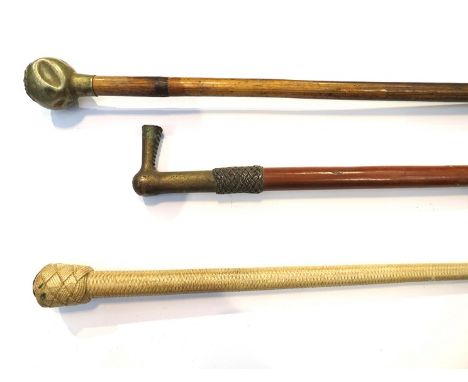 A Dorsetshire Regiment swagger stick and two riding crops (3). From The Oxburgh Hall Collection