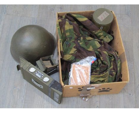 A WWII US M6 tank peirscope together with Dutch helmet, bicycle lamp, tea caddy and later British camo combat smock etc 
