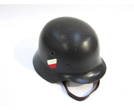 A German helmet shell with replacement army decals. Buyer to determine age