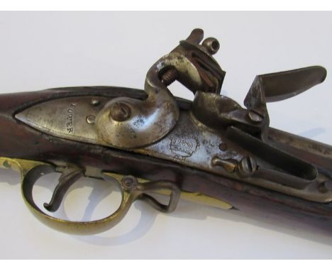 A Brown Bess India pattern flintlock military musket with GR tower lock, standard India pattern brass furniture stock marking