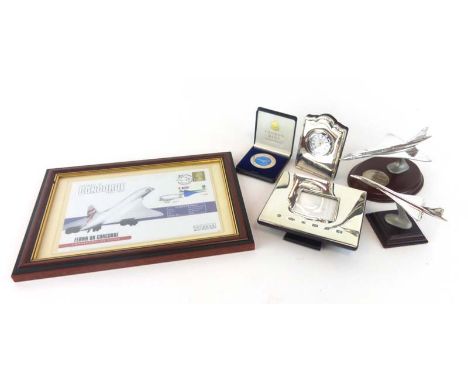 Of Concorde Interest: a commemorative photograph of the final flight, a 1969-2003 commemorative medallion, a boxed crystal pa