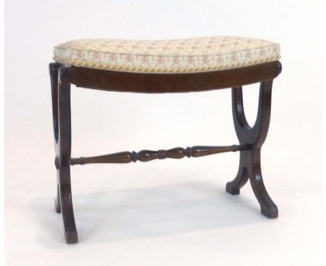 A 20th century stained beech and upholstered X-frame stool