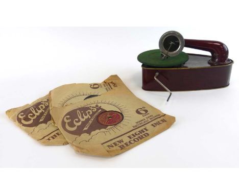 A Bing Bingola III tinplate child's record player and records