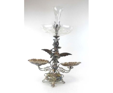 An early 20th century silver plated table centre in the Art Nouveau manner, the etched glass flute and bowl above a figural s