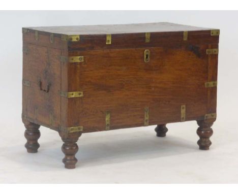 A 19th century mahogany and brass bound campaign/tea trunk, the interior with a candle box, on turned feet, w. 71 cm CONDITIO