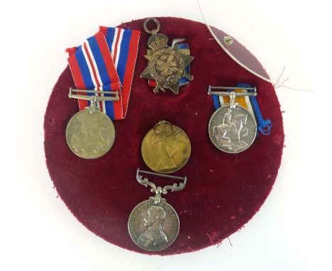 A First World War tri of medals awarded to '7554 Sgt J. Smith 1/2 Staff R.' including a 1914 Mons Star with a clasp, a 1914-1