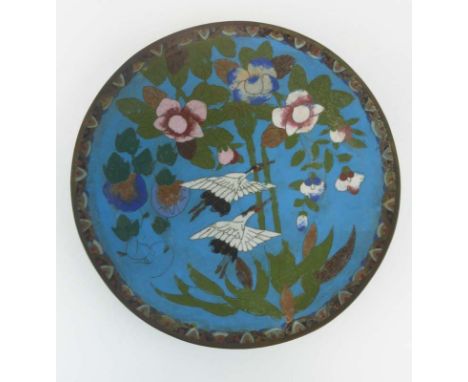A cloisonne charger decorated with cranes on a pale blue ground, d. 30 cm CONDITION REPORT: Some losses to enamel and wear