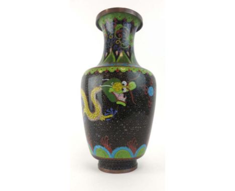 A cloisonne vase of baluster form decorated with a pair of dragons on a famille noir ground, h. 33 cm CONDITION REPORT: Some 