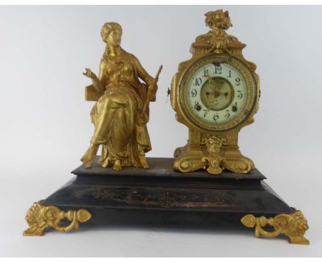 A late 19th century American mantle clock by Ansonia, the movement striking on a gong, the face with Arabic numerals and a vi