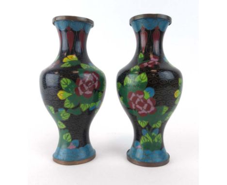 A pair of cloisonne vases of baluster form decorated with birds and flowers on a famille noir ground, h. 18.5 cm CONDITION RE