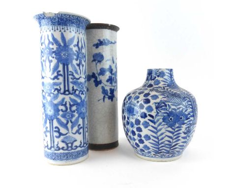 An early 20th century Chinese blue and white vase of shouldered form decorated with dragons amongst a foliate ground, charact