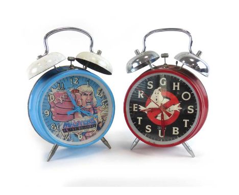 Two vintage alarm clocks for Ghostbusters and He Man CONDITION REPORT: Working order unknown