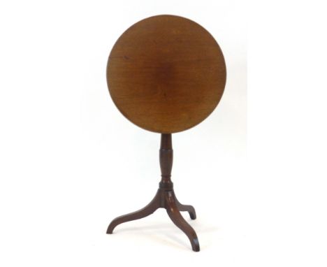 A George III mahogany occasional table, the circular tilt-top on a turned column and tripod base, d. 51 cm   CONDITION REPORT