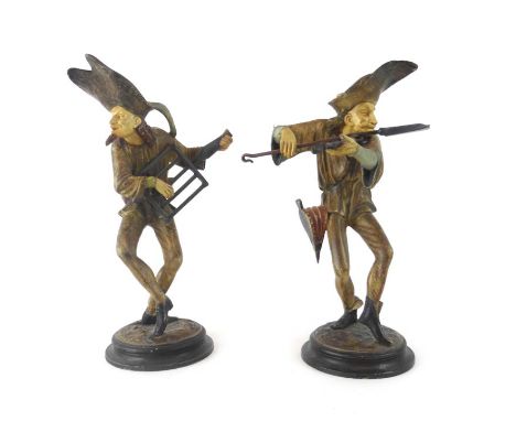 A pair of late 19th/early 20th century spelter figures modelled as gentlemen playing the fool, h. 30 cm each CONDITION REPORT