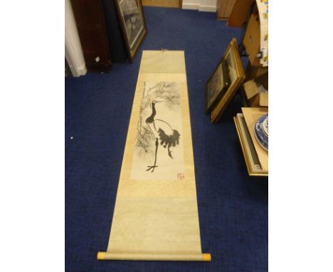 A Chinese hand painted scroll depicting a crane beneath a pine tree, signed, overall 270 x 63 cm, with blue linen bag CONDITI