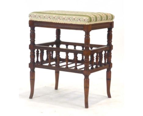 An Edwardian mahogany and upholstered piano stool