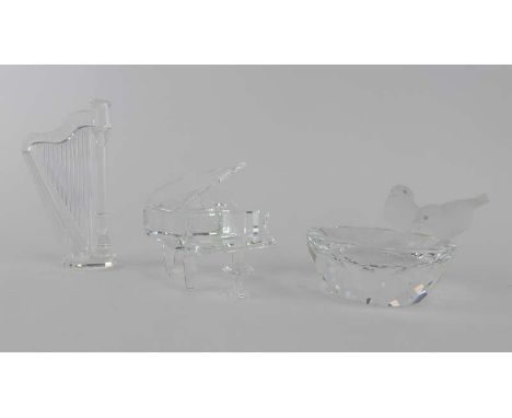 Three Swarovski Silver Crystal figures modelled as a harp, a grand piano and stool and a two birds seated on a bird bath, max