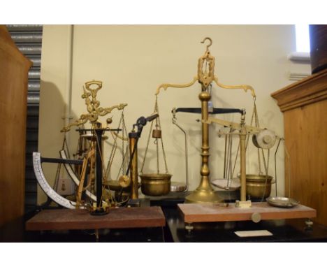 Assorted beam, balance and pillar scales, largest 64.5cm high  