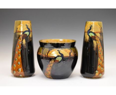 Thomas Forrester &amp; Sons Phoenix Ware - Tall pair of vases and jardinière or planter, each with tube-lined peacock decorat