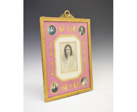 Late 19th Century French Palais Royal-style photograph frame having a central portrait within moiré silk surround having gilt