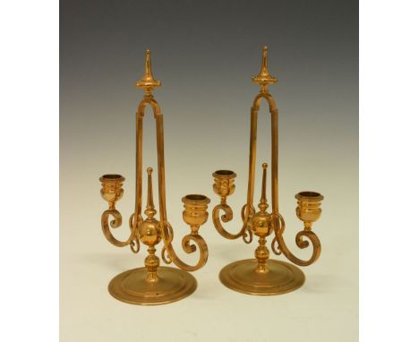 Pair of copper two-branch table candelabra, 30cm high  