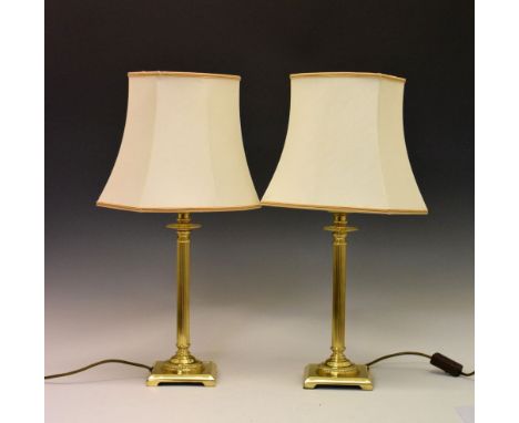 Pair of brass column table lamps with shades, 61cm high  