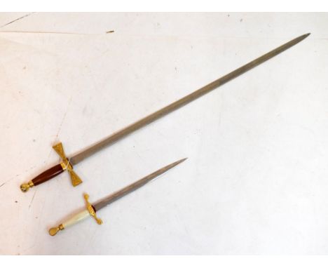 Commemorative type sword by Wilkinson's, 76cm double edged blade etched with castle, knights jousting and a standing knight h