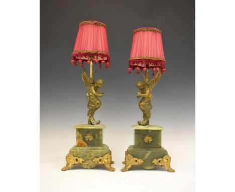 Pair of gilt metal-mounted green onyx table lamps, each with pleated silk shade over angel decoration on stepped base, 50.5cm