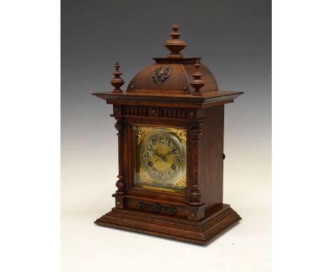 Early 20th Century German oak-cased mantel clock, with Junghans movement striking on a coiled gong, 42cm high  