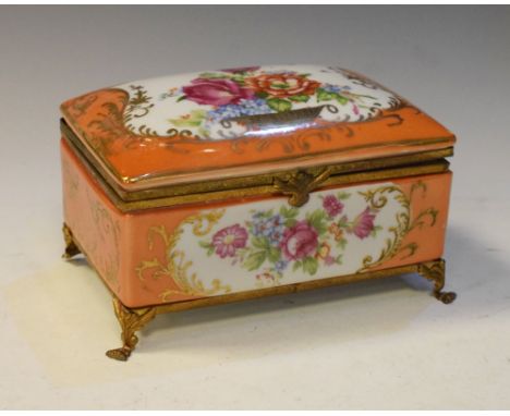 French porcelain trinket box with floral decoration, on gilt paw feet, 13.5cm wide  