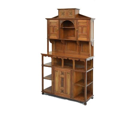 Late Victorian Aesthetic Period walnut salon cabinet of architectural form with carved flowerhead decoration, panelled cupboa