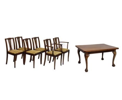 Early 20th Century walnut dining table on cabriole legs with claw and ball feet, together with a set of six later chairs (7) 