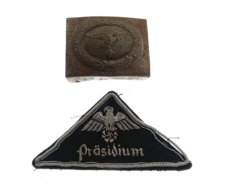 Nazi German Third Reich metal belt buckle, having eagle and swastika motif, together with fabric sleeve patch, a/f  